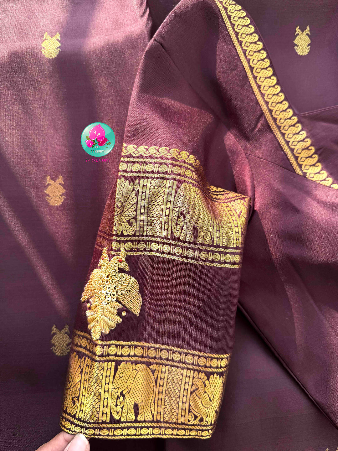 A Legacy of Power: Trendy Brown Kanchipattu silk Saree with Commanding Gandaberunda Motifs