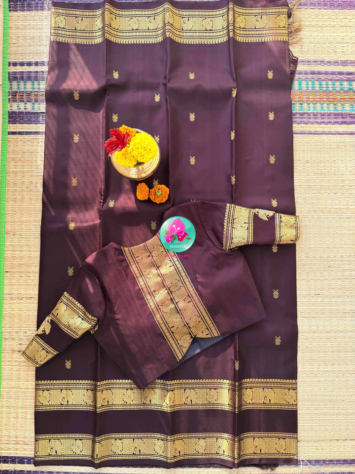 A Legacy of Power: Trendy Brown Kanchipattu silk Saree with Commanding Gandaberunda Motifs