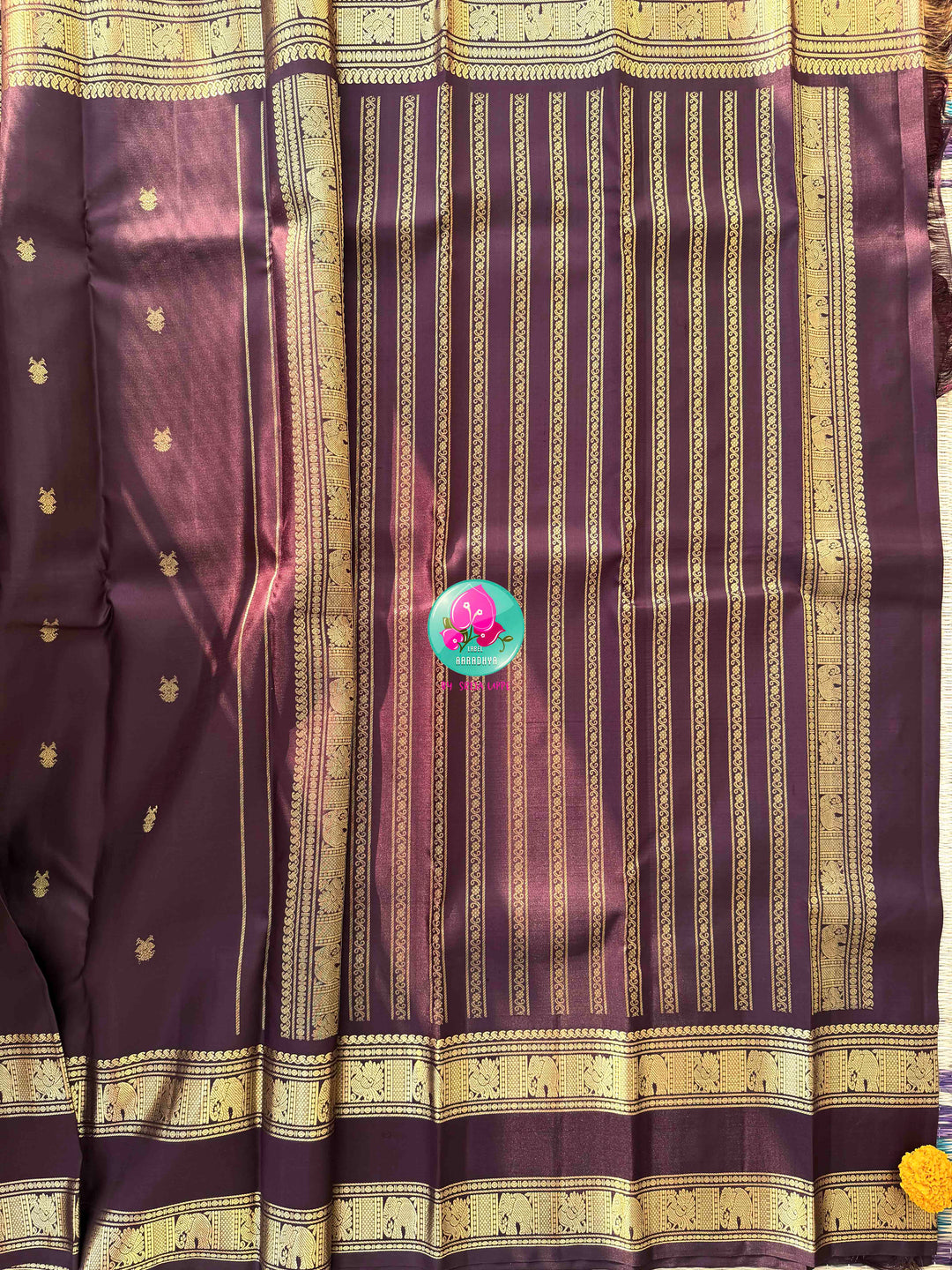 A Legacy of Power: Trendy Brown Kanchipattu silk Saree with Commanding Gandaberunda Motifs