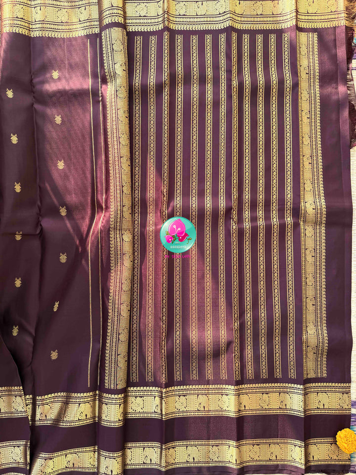 A Legacy of Power: Trendy Brown Kanchipattu silk Saree with Commanding Gandaberunda Motifs