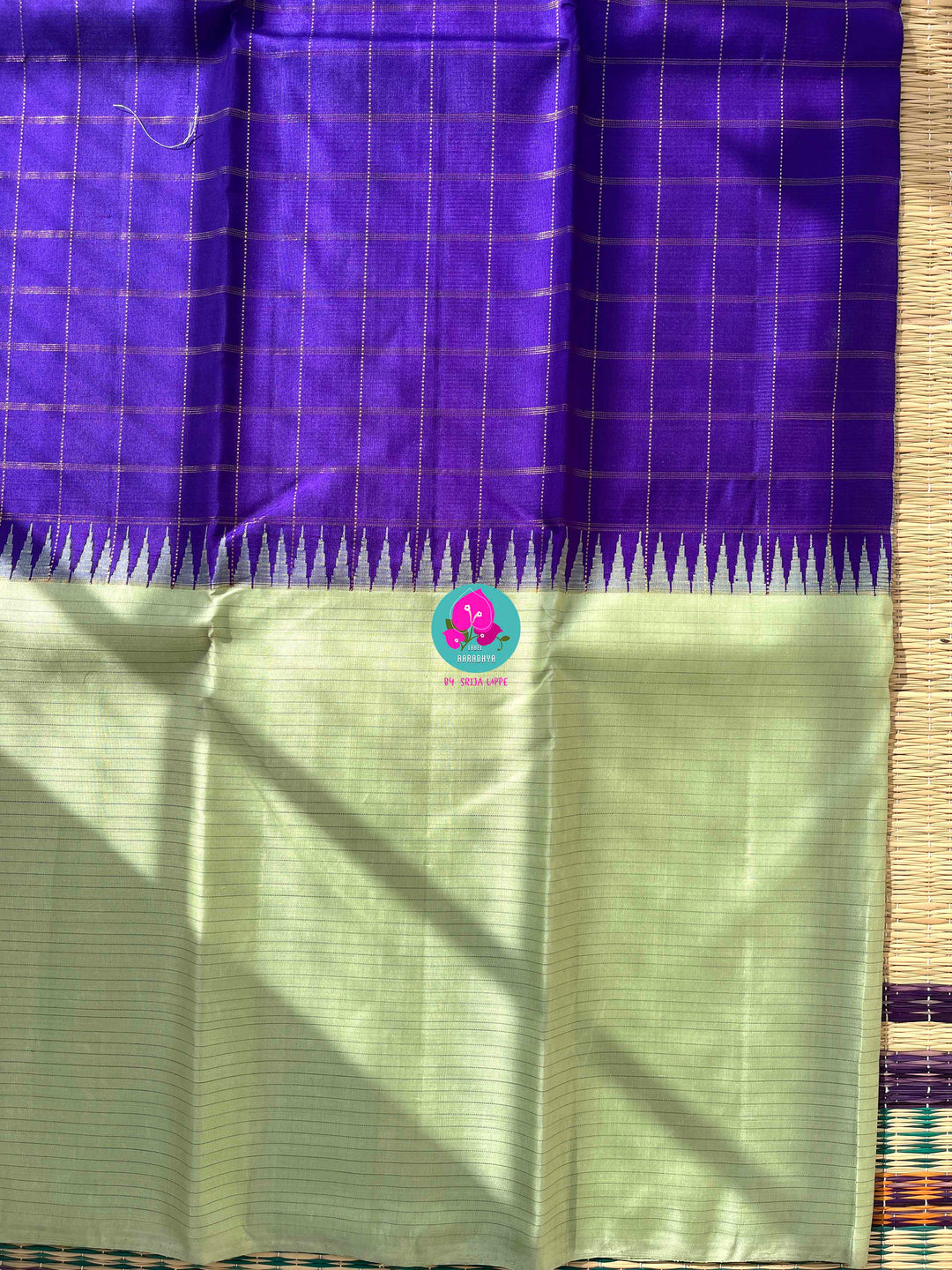 The Royal Jewel: Checkered Blue-Violet Silk Saree Paired with Hand-Embroidered Bird Blouse