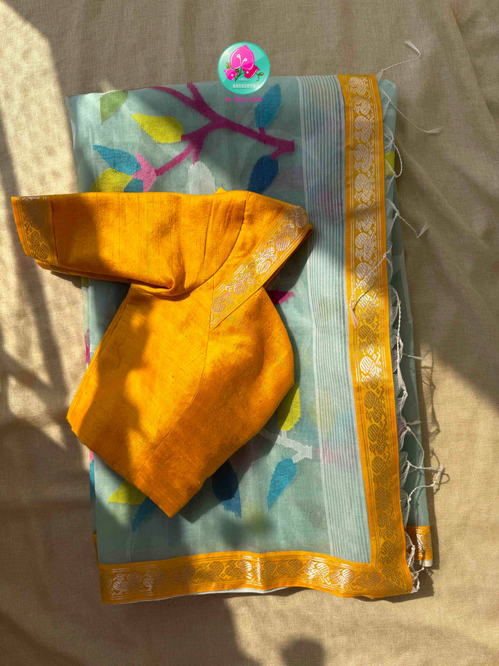 Ethereal Sheer Artistry: Powder Blue Jamdani-Kanchi Organza Silk Saree with Sunburst Mustard Raw Silk Blouse