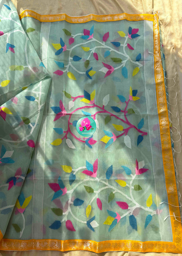 Ethereal Sheer Artistry: Powder Blue Jamdani-Kanchi Organza Silk Saree with Sunburst Mustard Raw Silk Blouse