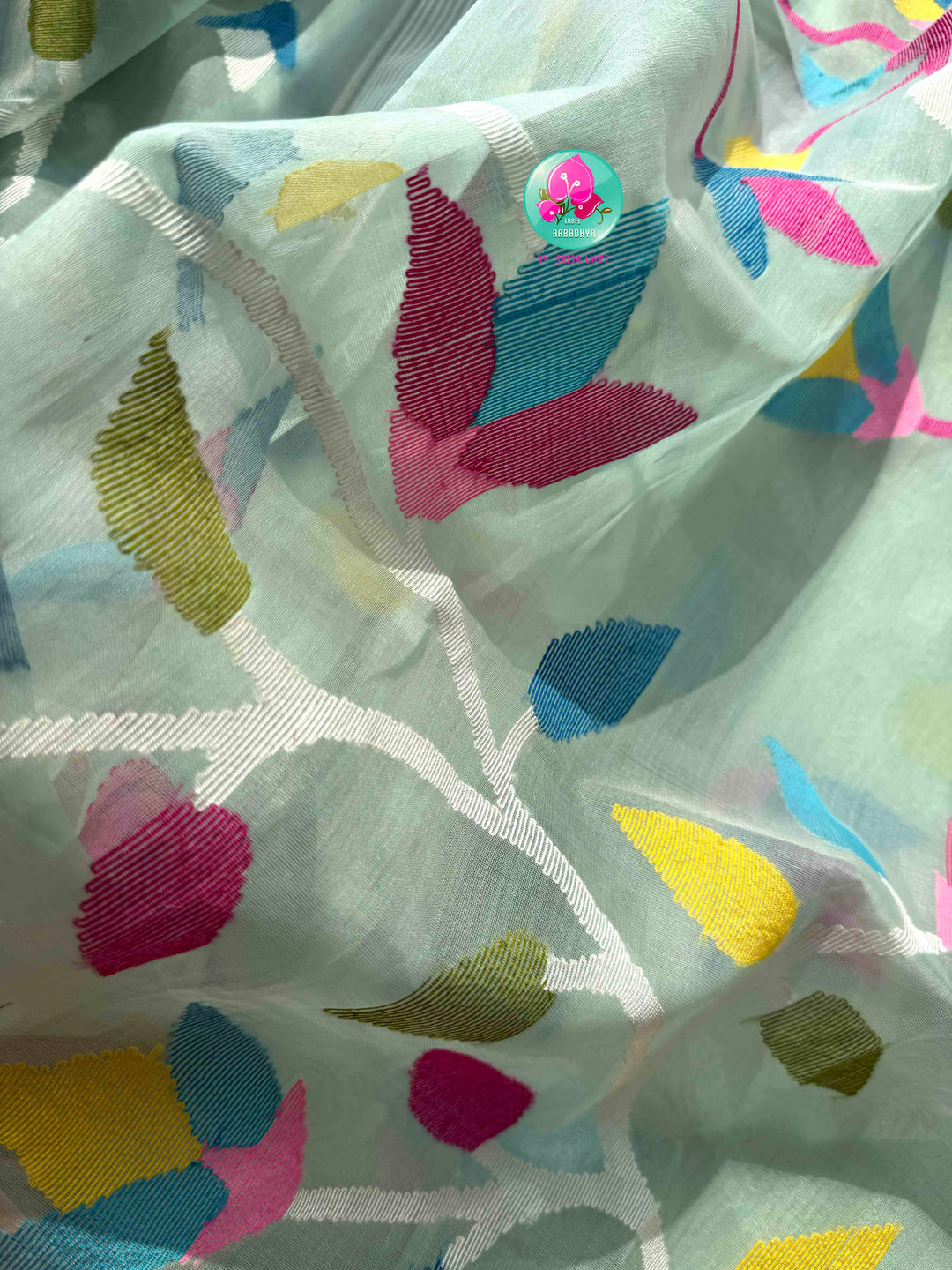 Ethereal Sheer Artistry: Powder Blue Jamdani-Kanchi Organza Silk Saree with Sunburst Mustard Raw Silk Blouse