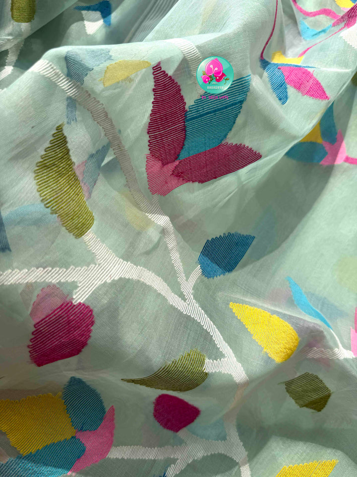 Ethereal Sheer Artistry: Powder Blue Jamdani-Kanchi Organza Silk Saree with Sunburst Mustard Raw Silk Blouse
