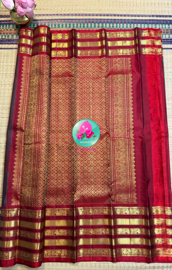Emerald Enchantment: Pure 2G Kanchipattu with Vaira Oosi & Grand Animal Motifs