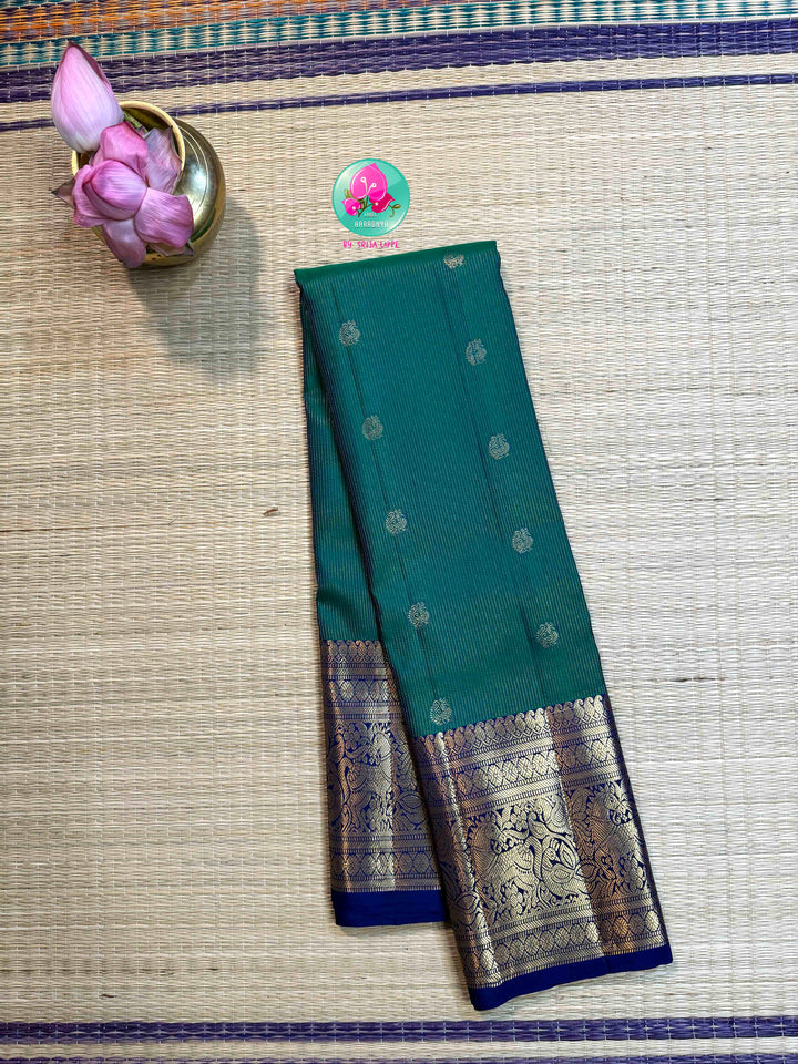 Gilded Peacock: Peacock Green Vaira Oosi Kanchipattu with Royal Blue Big Border