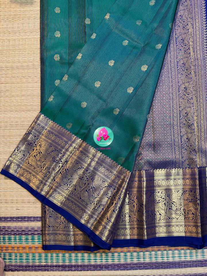 Gilded Peacock: Peacock Green Vaira Oosi Kanchipattu with Royal Blue Big Border
