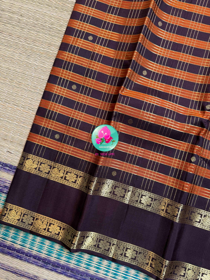Autumn Embers: Trending Rust Orange Kanchipattu Saree with Earthen Brown Majesty