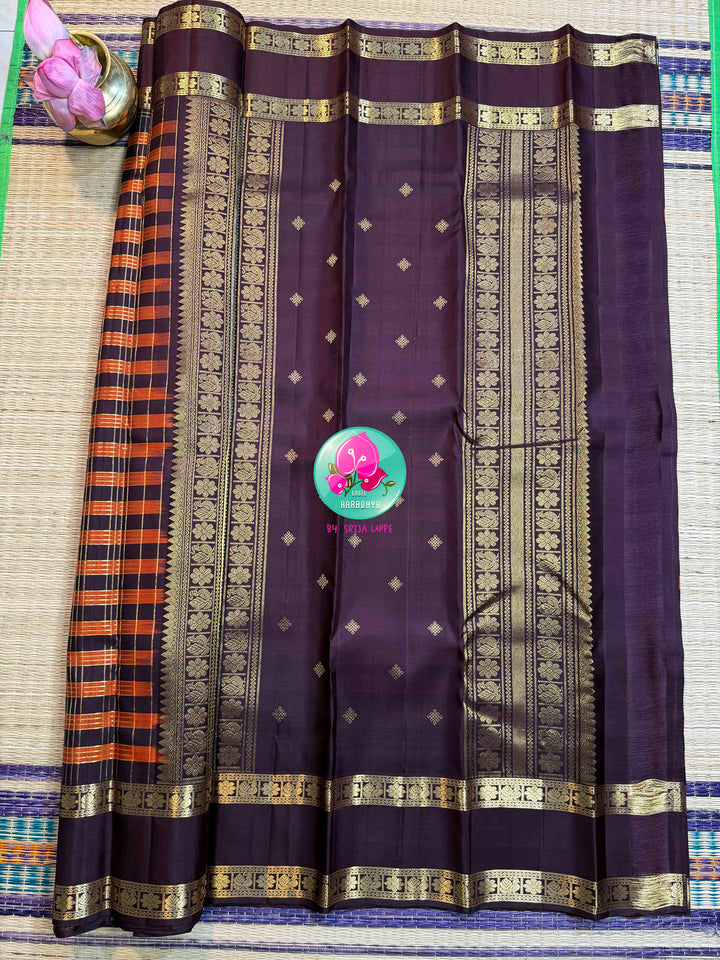 Autumn Embers: Trending Rust Orange Kanchipattu Saree with Earthen Brown Majesty