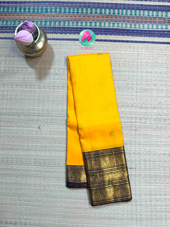 The Gilded Sun: Yellow 2G Pure Kanchipattu Saree with Earthen Brown & Sacred Motifs