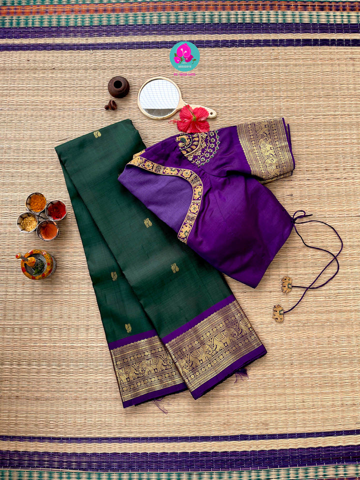 Vintage classic Kanchipattu saree in beautiful bottle green and purple Paired with hand embroidered blouse