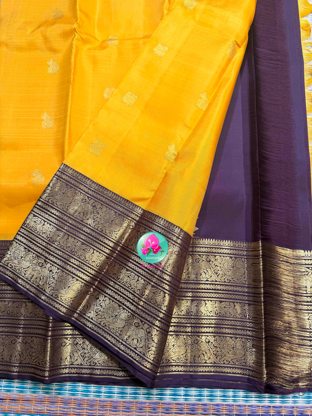 The Gilded Sun: Yellow 2G Pure Kanchipattu Saree with Earthen Brown & Sacred Motifs