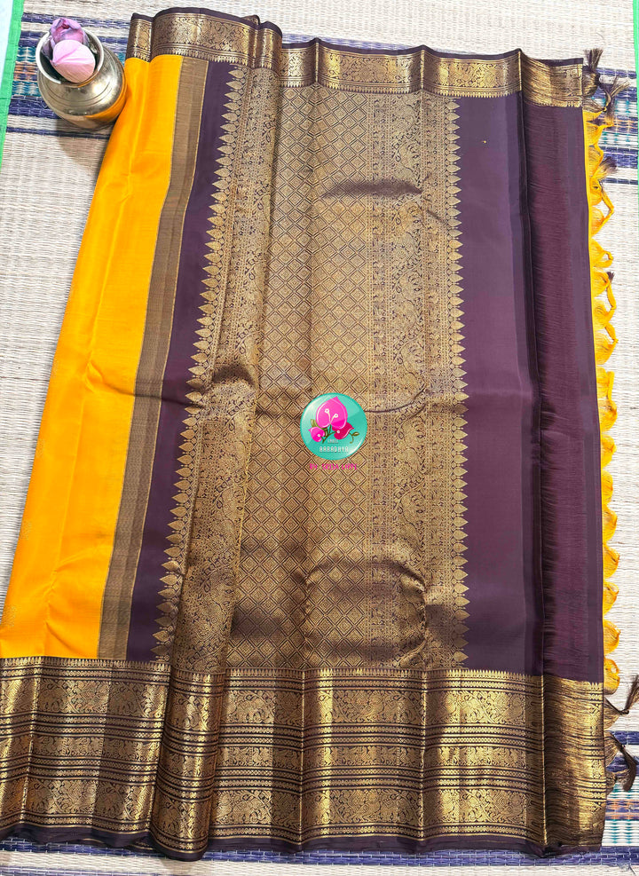 The Gilded Sun: Yellow 2G Pure Kanchipattu Saree with Earthen Brown & Sacred Motifs