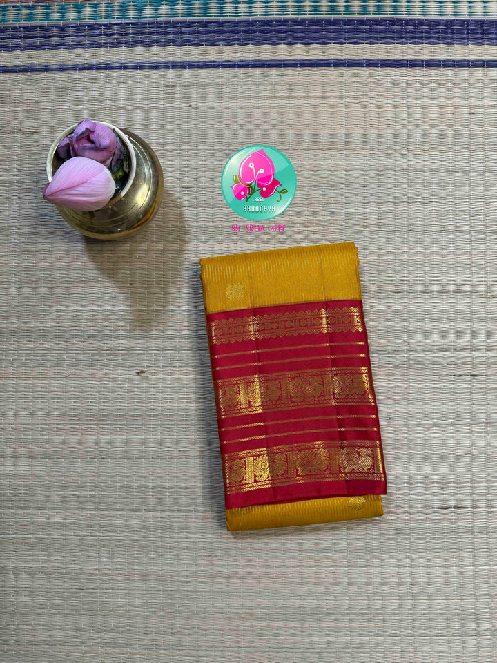The Sacred Spark: Mustard Vaira Oosi Kanchipattu Saree with Grand Crimson Borders