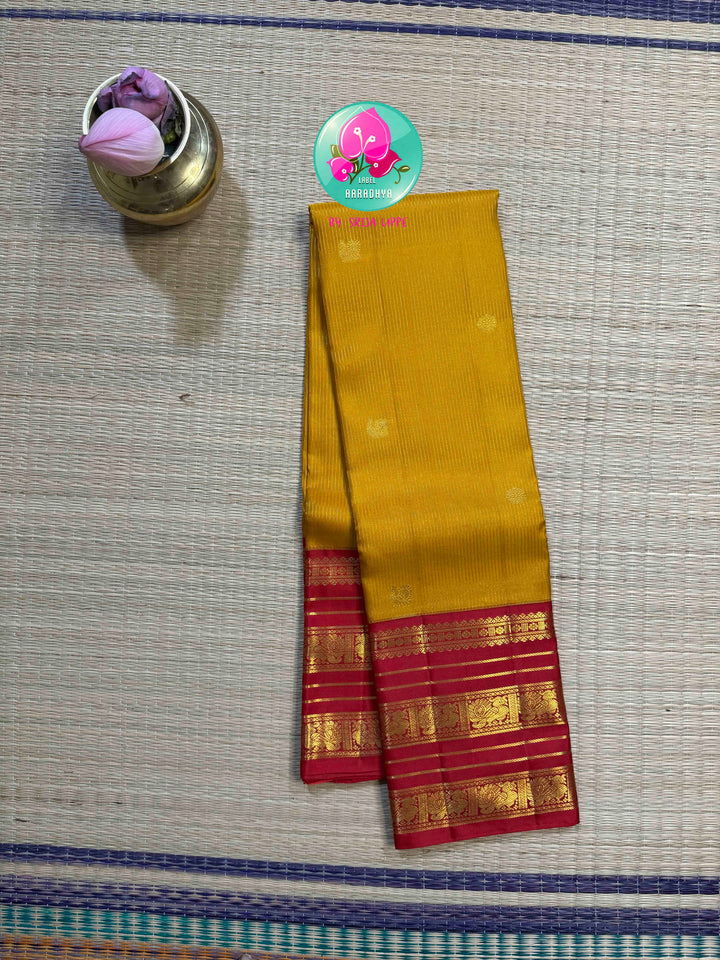 The Sacred Spark: Mustard Vaira Oosi Kanchipattu Saree with Grand Crimson Borders