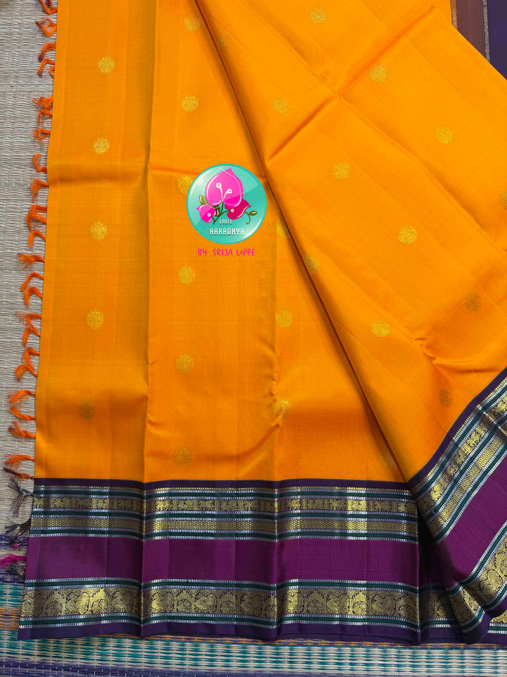 The Sovereign Sun: Saffron Orange pure 2G Kanchipattu Saree with Imperial Lion Pallu