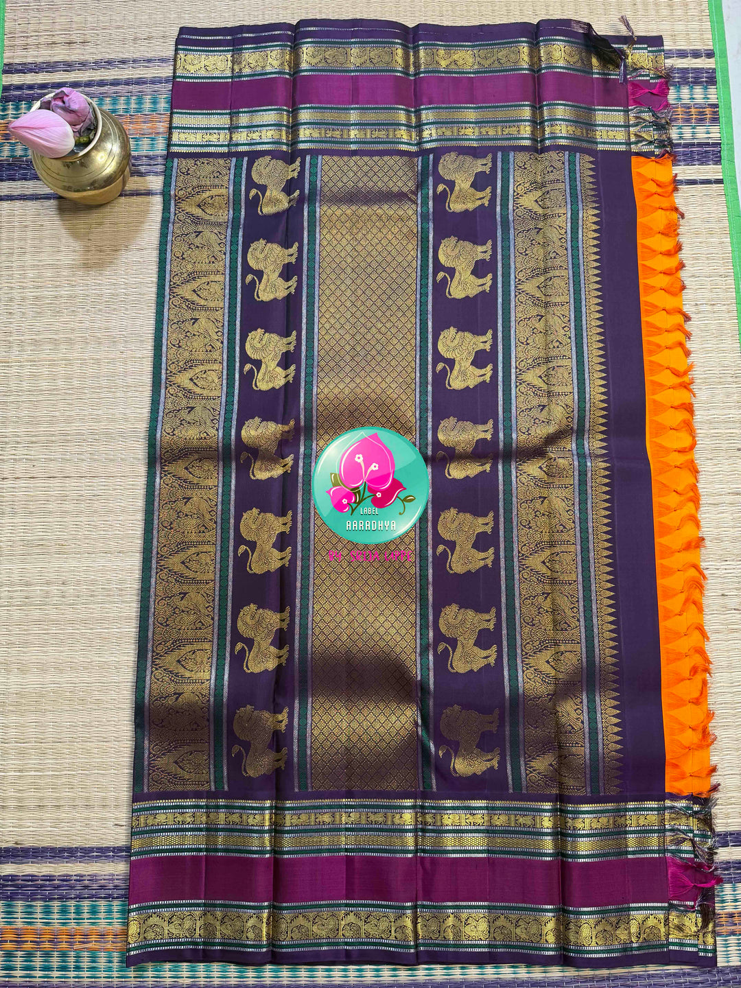 The Sovereign Sun: Saffron Orange pure 2G Kanchipattu Saree with Imperial Lion Pallu