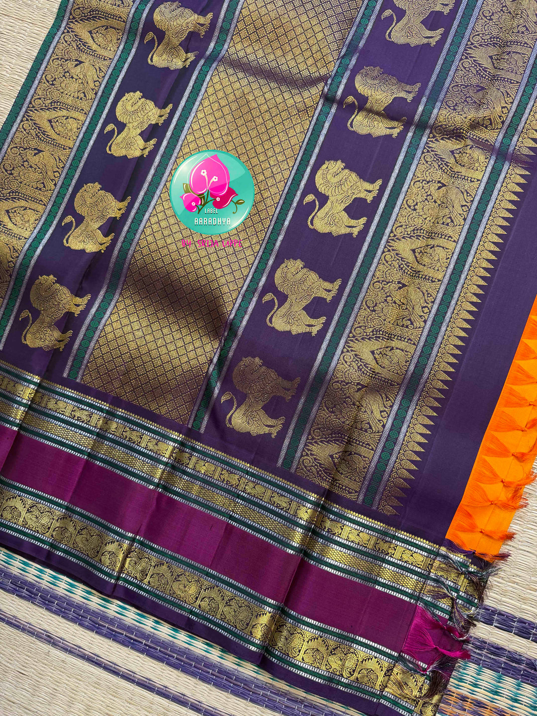 The Sovereign Sun: Saffron Orange pure 2G Kanchipattu Saree with Imperial Lion Pallu