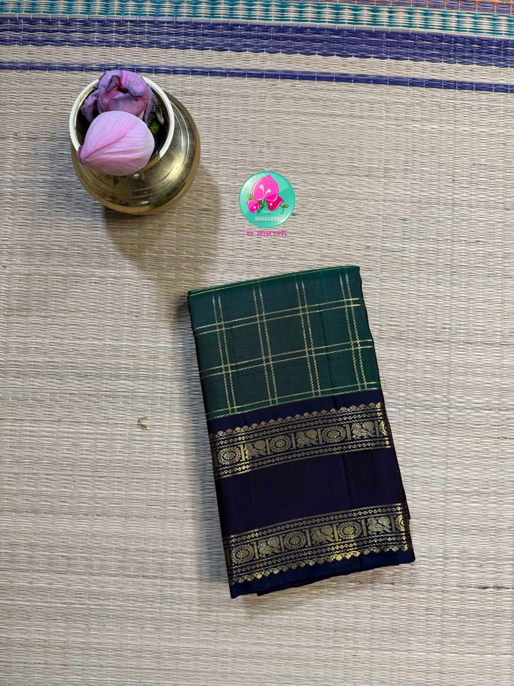 Emerald Checkmate: Bottle Green 2G Kanchipattu Saree with Sapphire Blue Contrast