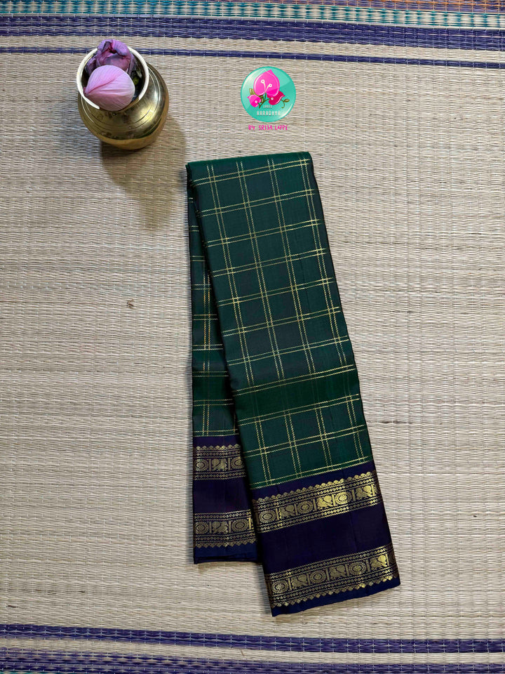 Emerald Checkmate: Bottle Green 2G Kanchipattu Saree with Sapphire Blue Contrast