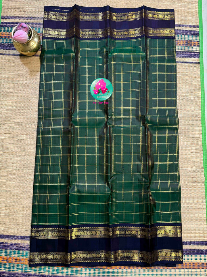 Emerald Checkmate: Bottle Green 2G Kanchipattu Saree with Sapphire Blue Contrast