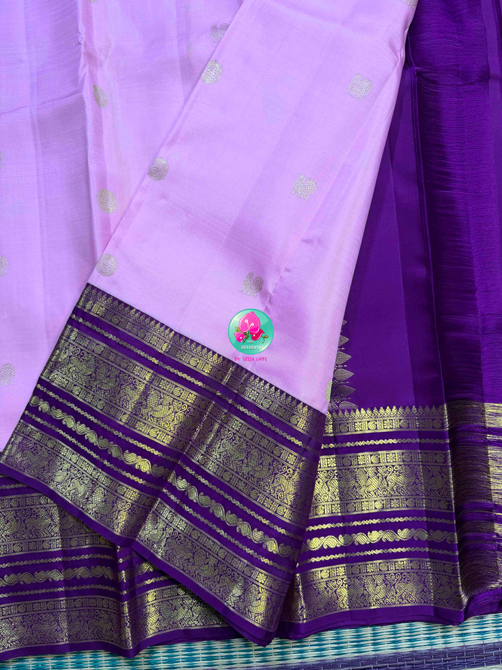 "Decemberaalu": Light Lilac Pure Kanchipattu Saree with Royal Amethyst Borders