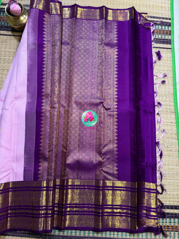 "Decemberaalu": Light Lilac Pure Kanchipattu Saree with Royal Amethyst Borders