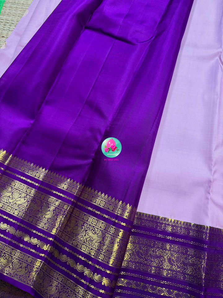 "Decemberaalu": Light Lilac Pure Kanchipattu Saree with Royal Amethyst Borders