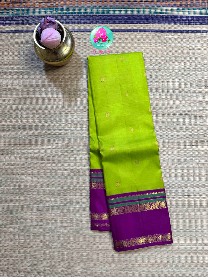 Verdant Bliss: Parrot Green 2G Kanchipattu Saree with Magenta Majesty