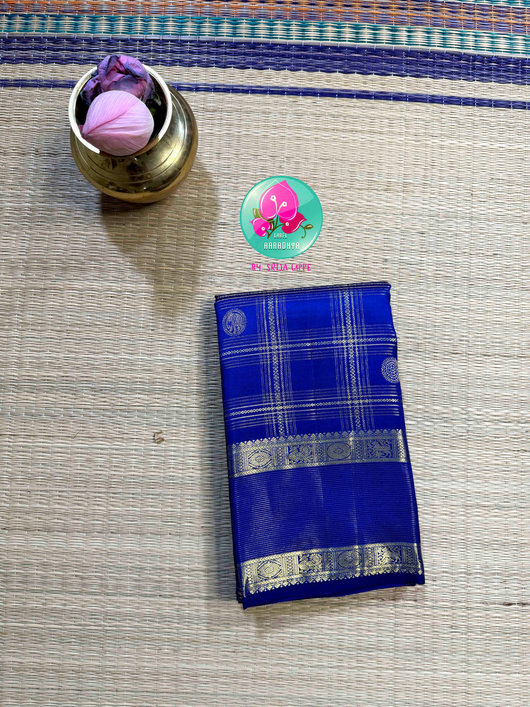 Sapphire Lattice: Classic Royal Blue Checked Kanchipattu saree with a Vaira Oosi Twist