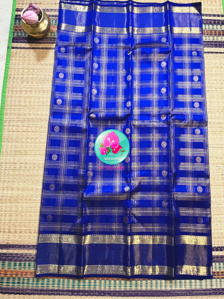 Sapphire Lattice: Classic Royal Blue Checked Kanchipattu saree with a Vaira Oosi Twist