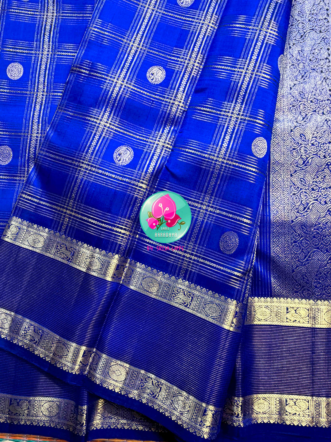 Sapphire Lattice: Classic Royal Blue Checked Kanchipattu saree with a Vaira Oosi Twist