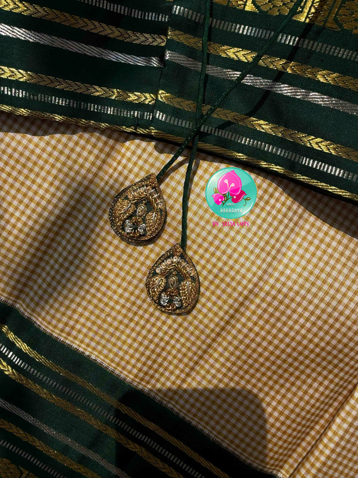 Dual-Metallic Heritage Splendor: Classy Beige Madras Checkered Saree with Bottle Green Border & Hand-Embroidered Maggam Blouse
