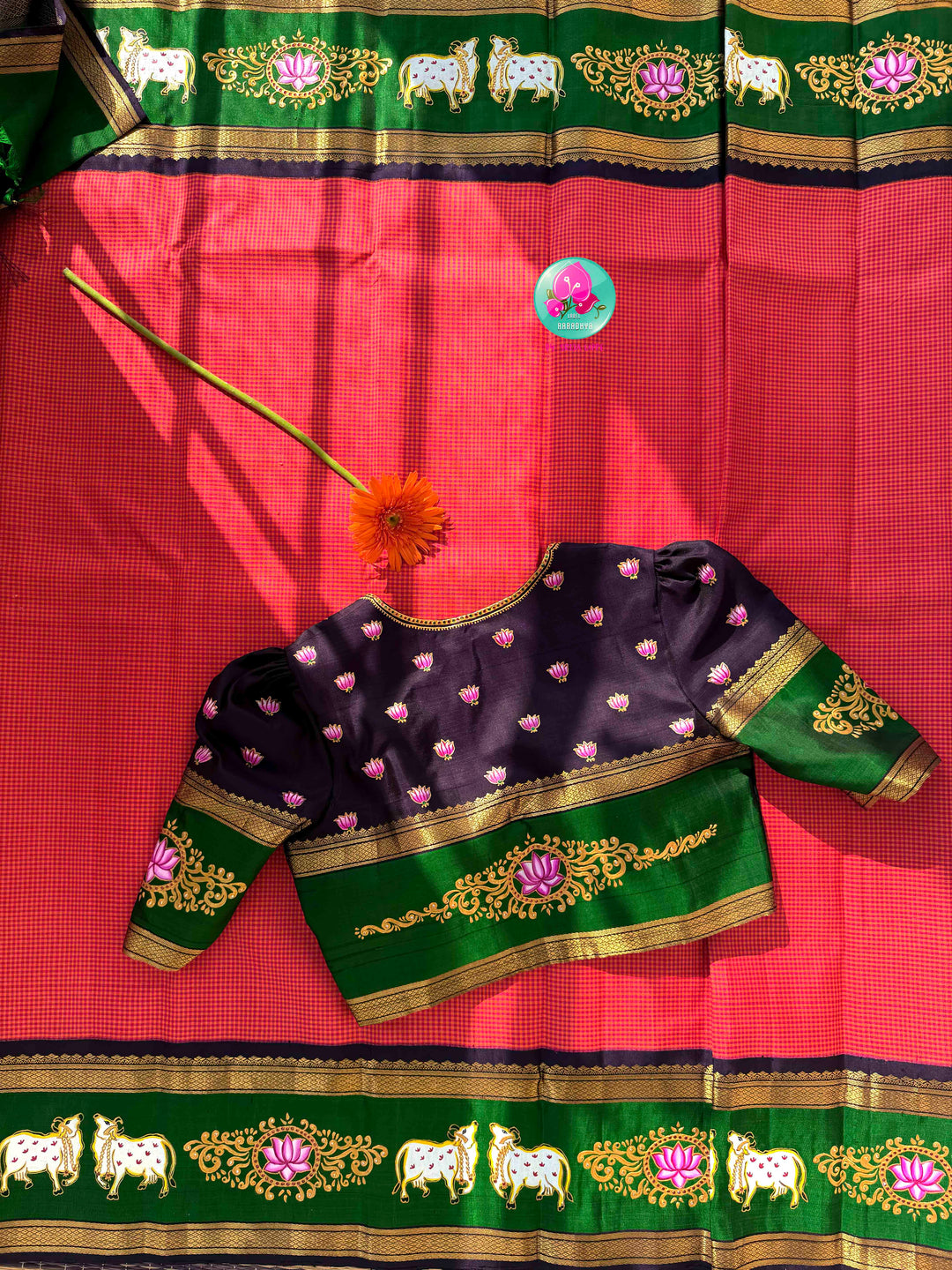 Sacred Pichwai Artistry & Sunset Radiance: Reddish-Orange Mini Checks Pure Kanjeevaram Saree with Hand-Painted Plum Blouse