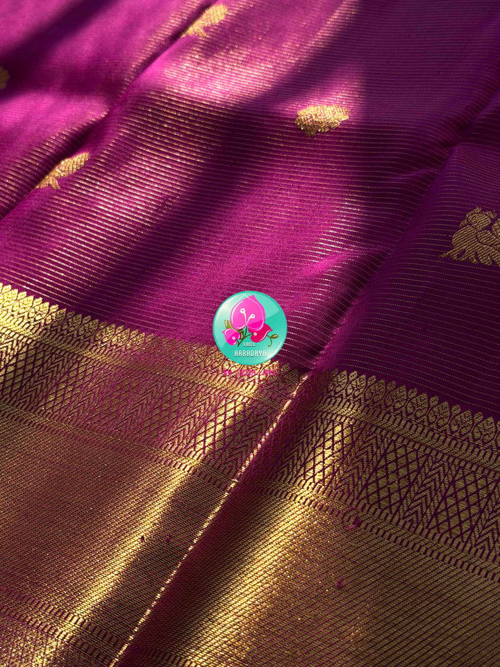 Magenta Radiance: 1g Zari Vaira Oosi Kanchipattu with Rangoli Artistry