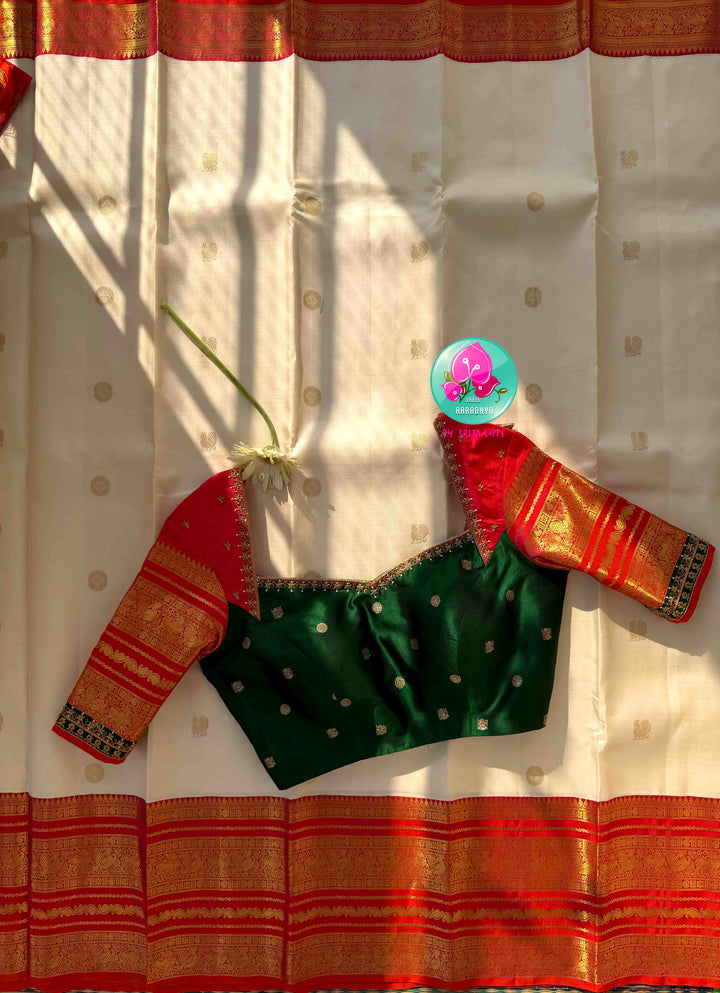 Divine Temple Grandeur: Pure Off-White & Crimson Red Kanjeevaram Silk Saree with Hand-Embroidered Emerald Fusion Blouse