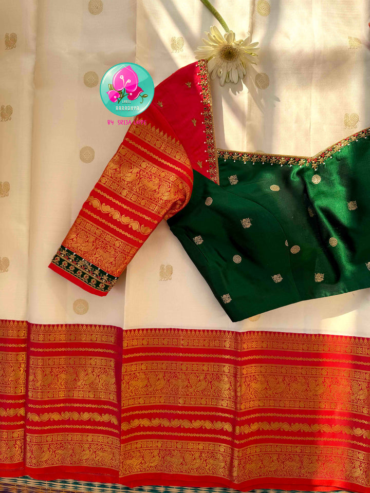 Divine Temple Grandeur: Pure Off-White & Crimson Red Kanjeevaram Silk Saree with Hand-Embroidered Emerald Fusion Blouse