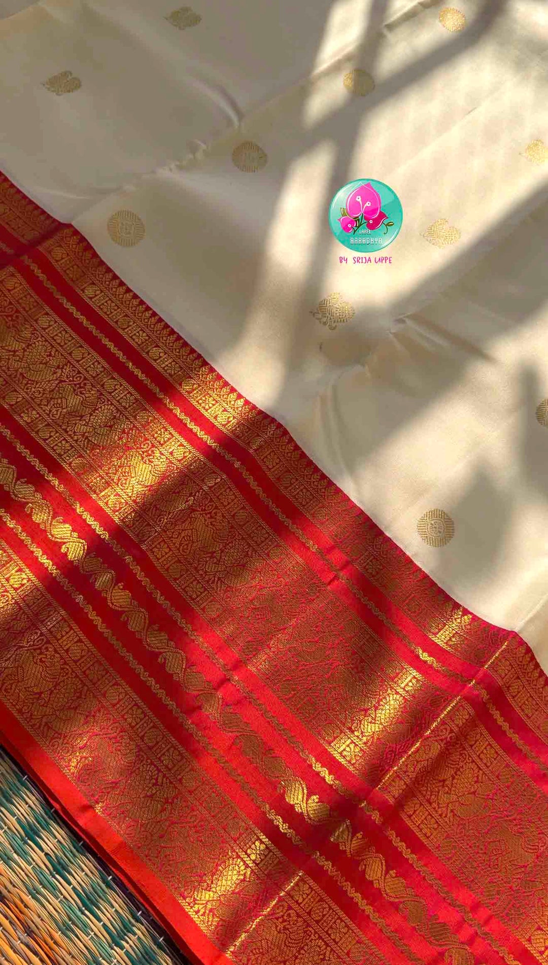 Divine Temple Grandeur: Pure Off-White & Crimson Red Kanjeevaram Silk Saree with Hand-Embroidered Emerald Fusion Blouse