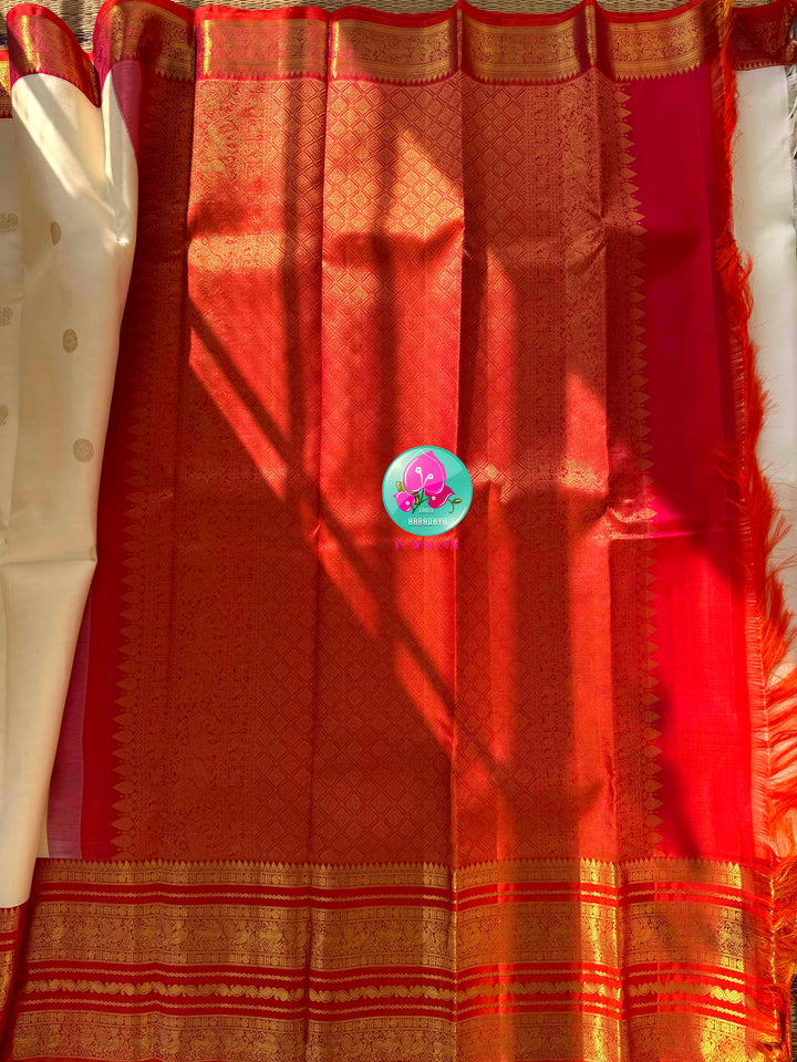 Divine Temple Grandeur: Pure Off-White & Crimson Red Kanjeevaram Silk Saree with Hand-Embroidered Emerald Fusion Blouse