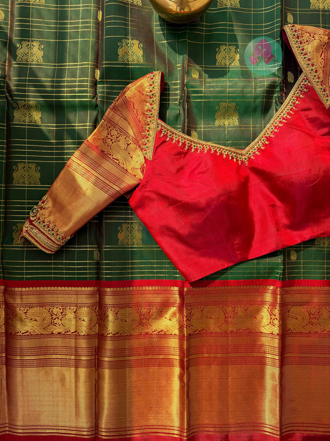 The Sovereign Lion: Emerald Kanchipattu saree with Imperial 2G Zari & Crimson Silk