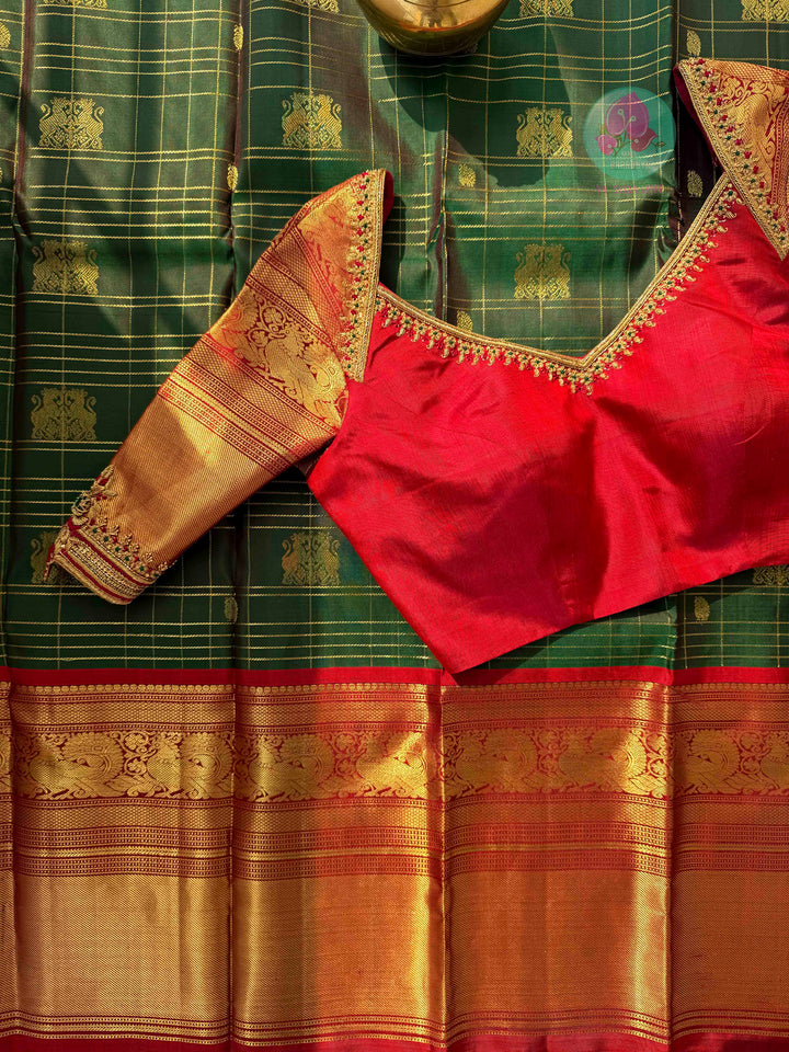 The Sovereign Lion: Emerald Kanchipattu saree with Imperial 2G Zari & Crimson Silk
