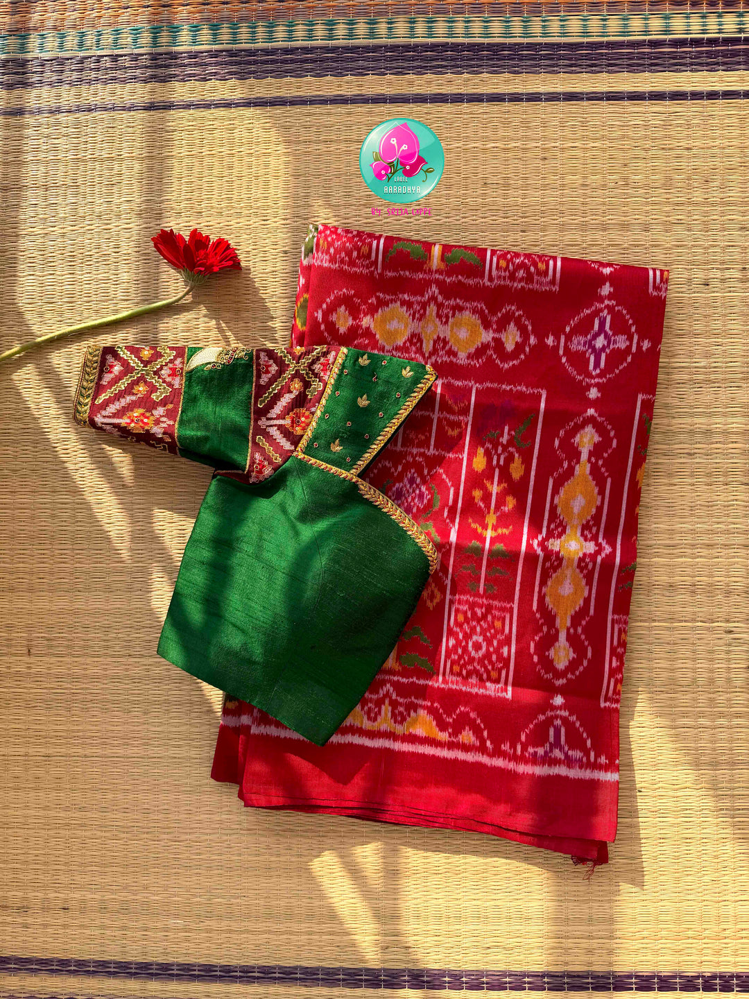 Heirloom Heritage & Regal Valour: 5-Ply Crimson Red Rajkot Patola Silk Saree with Hand-Embroidered Puligoru Emerald Green Raw Silk Blouse