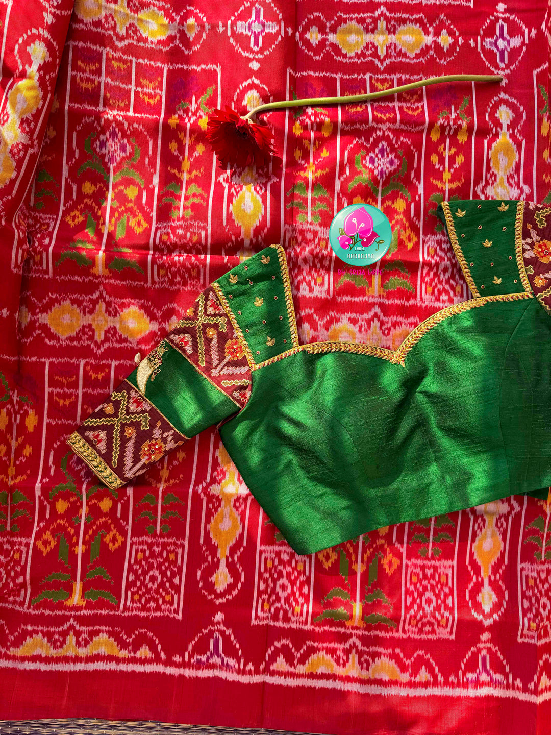 Heirloom Heritage & Regal Valour: 5-Ply Crimson Red Rajkot Patola Silk Saree with Hand-Embroidered Puligoru Emerald Green Raw Silk Blouse