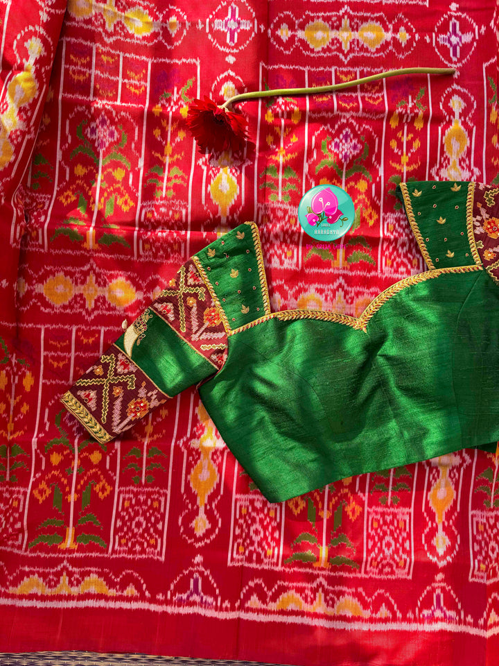 Heirloom Heritage & Regal Valour: 5-Ply Crimson Red Rajkot Patola Silk Saree with Hand-Embroidered Puligoru Emerald Green Raw Silk Blouse