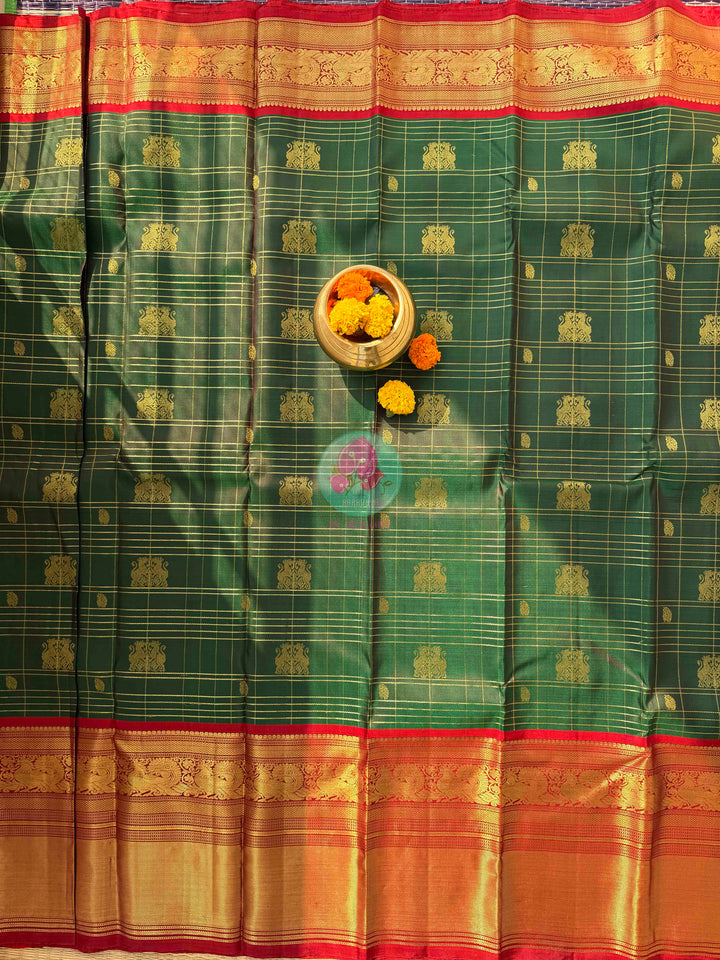 The Sovereign Lion: Emerald Kanchipattu saree with Imperial 2G Zari & Crimson Silk
