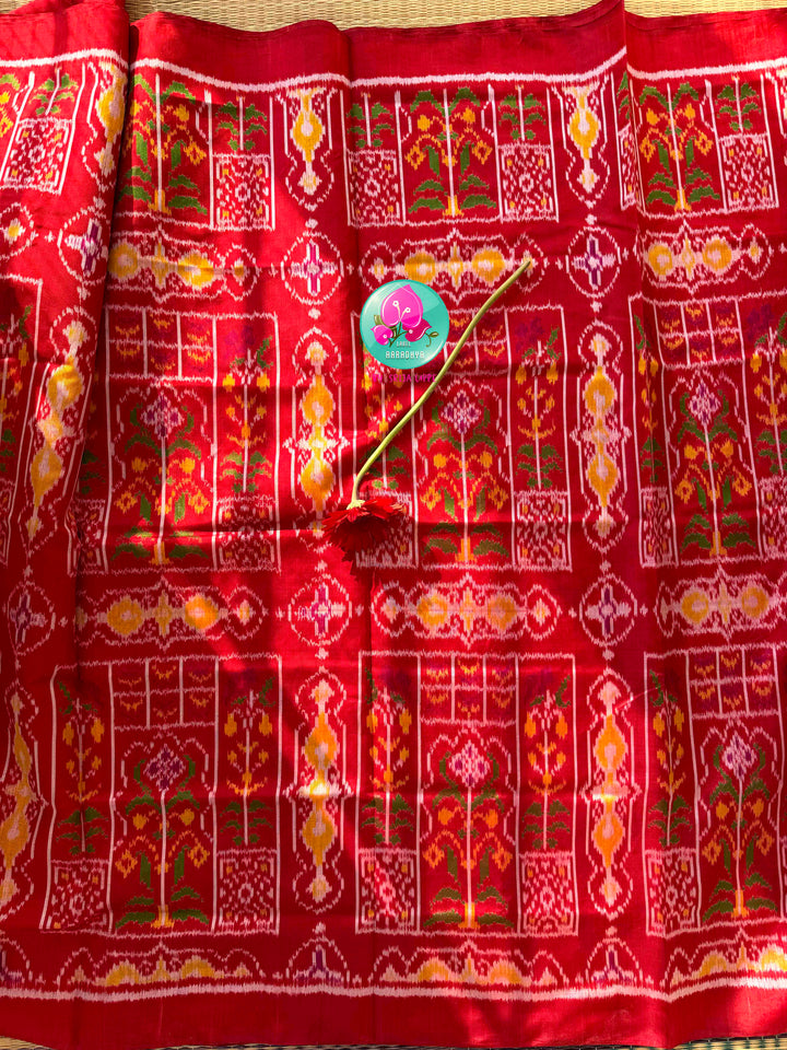 Heirloom Heritage & Regal Valour: 5-Ply Crimson Red Rajkot Patola Silk Saree with Hand-Embroidered Puligoru Emerald Green Raw Silk Blouse