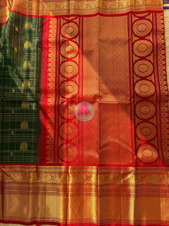 The Sovereign Lion: Emerald Kanchipattu saree with Imperial 2G Zari & Crimson Silk