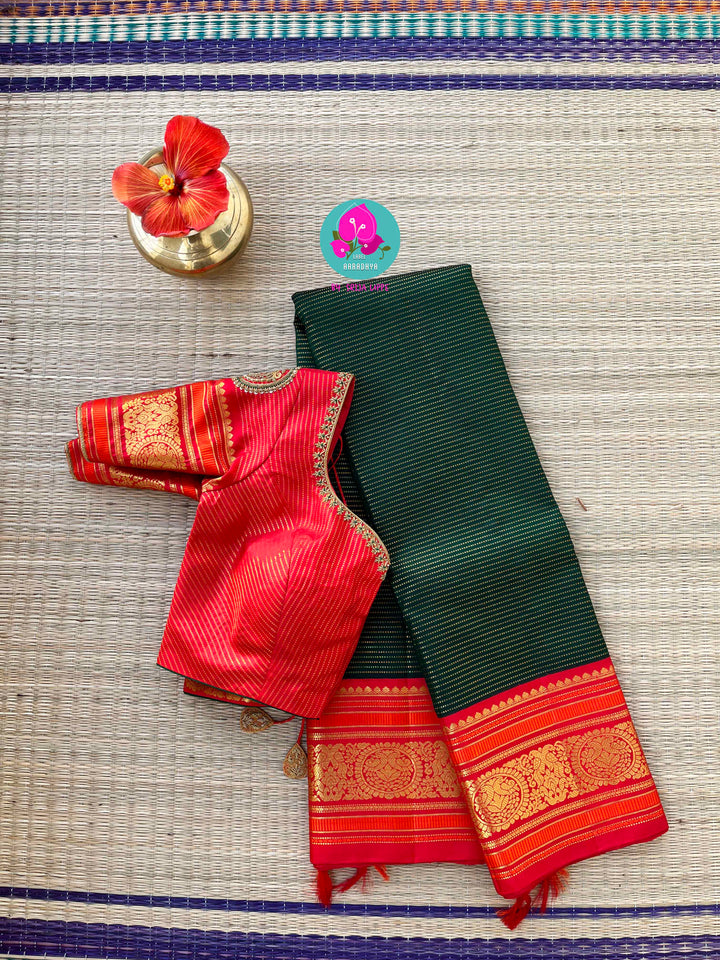 Regal Serenity: Deep Green Kanjivaram saree with Fiery Red Contrast Blouse