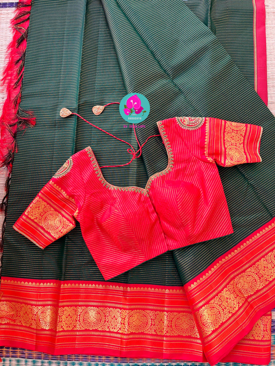 Regal Serenity: Deep Green Kanjivaram saree with Fiery Red Contrast Blouse